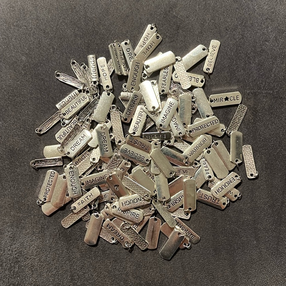 Mixed charms for jewelry making. Over 140 pieces.